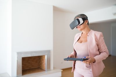 Person exploring a virtual tour with a VR headset